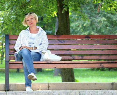 woman sitting on the bench