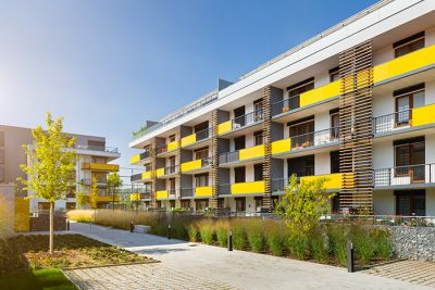 Condo community with yellow balconies
